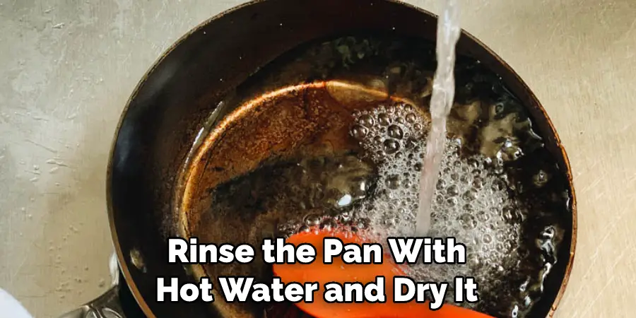Rinse the Pan With Hot Water and Dry It