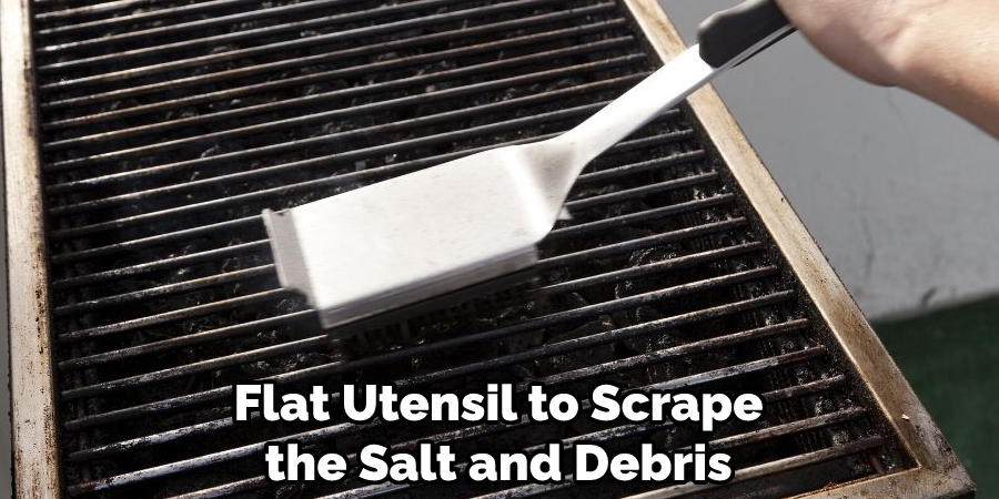 Flat Utensil to Scrape the Salt and Debris