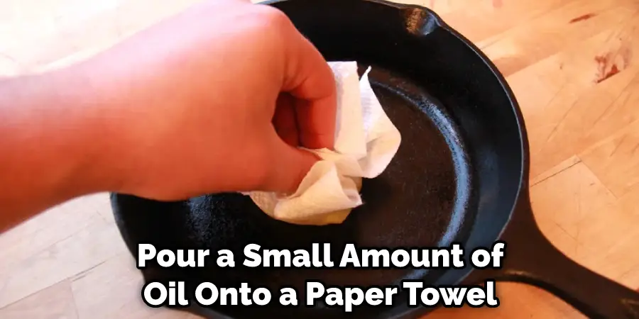 Pour a Small Amount of Oil Onto a Paper Towel