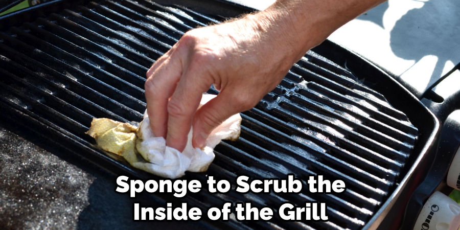 Sponge to Scrub the Inside of the Grill