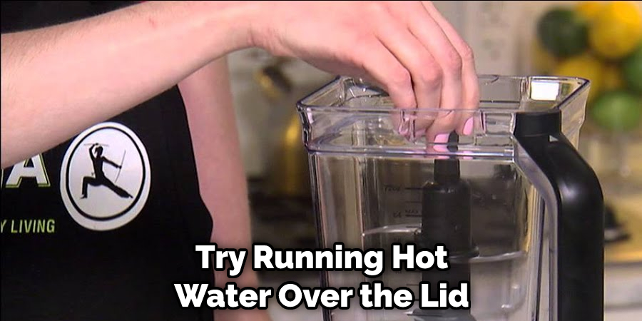 Try Running Hot Water Over the Lid