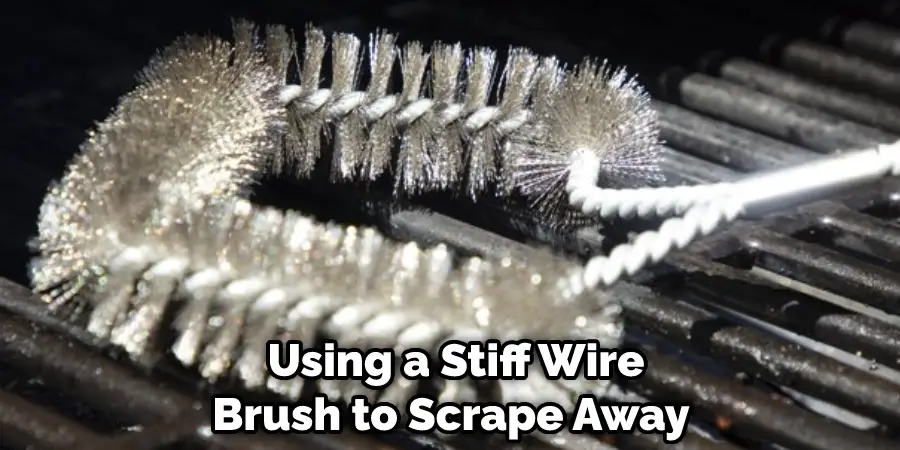 Using a Stiff Wire Brush to Scrape Away