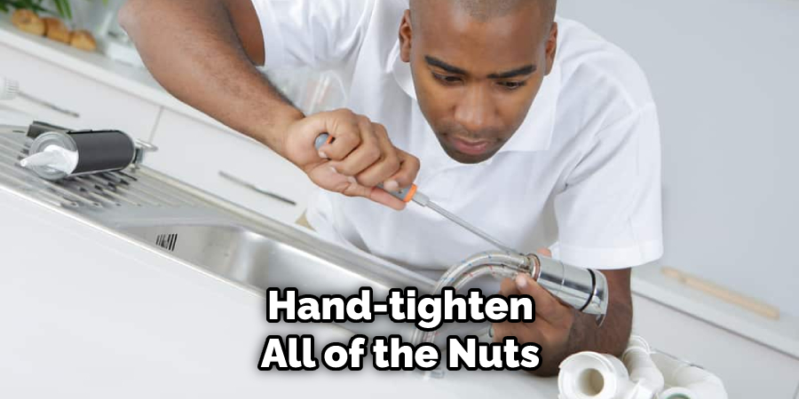 Hand-tighten All of the Nuts