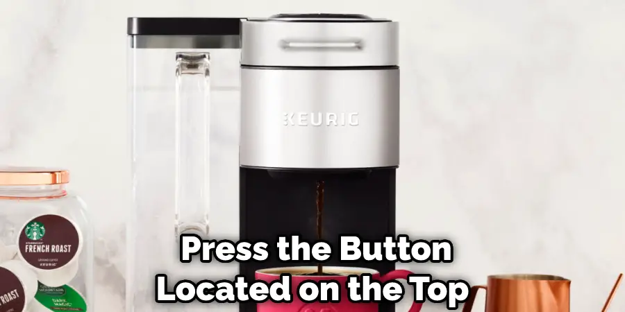  Press the Button Located on the Top