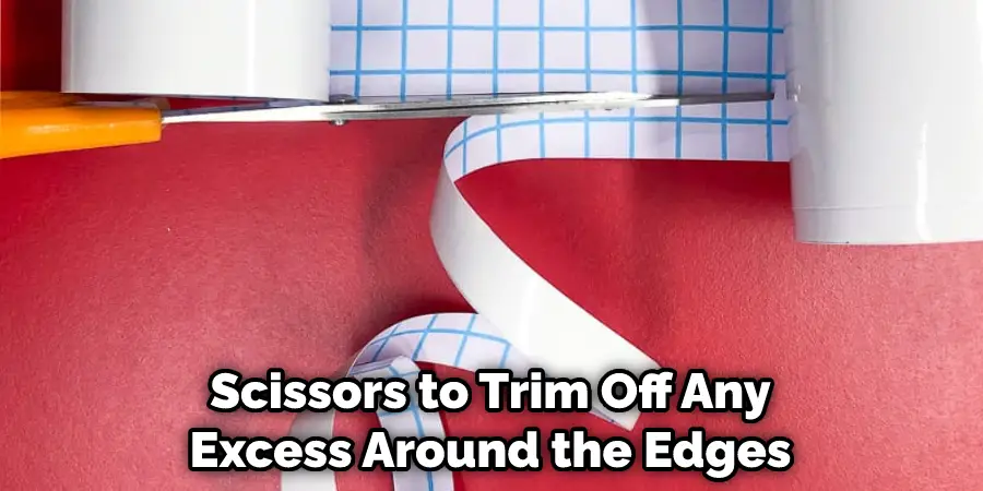 Scissors to Trim Off Any Excess Around the Edges
