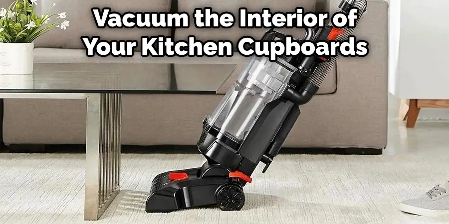 Vacuum the Interior of Your Kitchen Cupboards