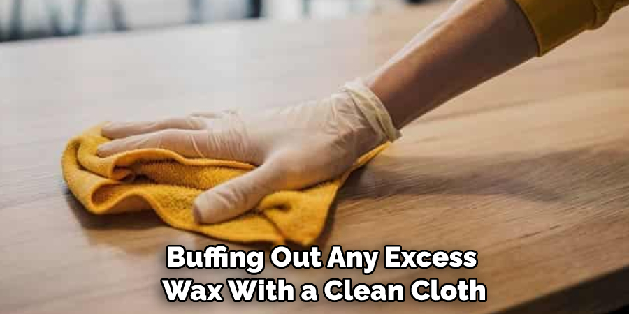 Buffing Out Any Excess Wax With a Clean Cloth