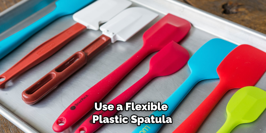 Use a Flexible Plastic Spatula