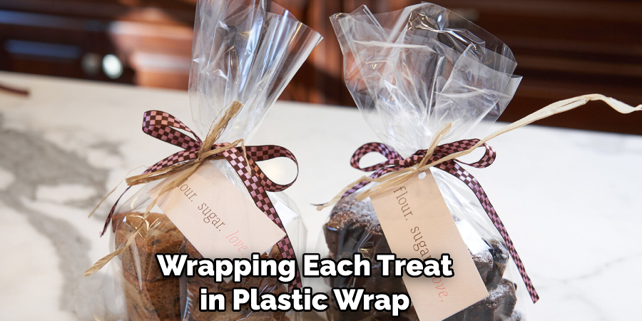 Wrapping Each Treat in Plastic Wrap