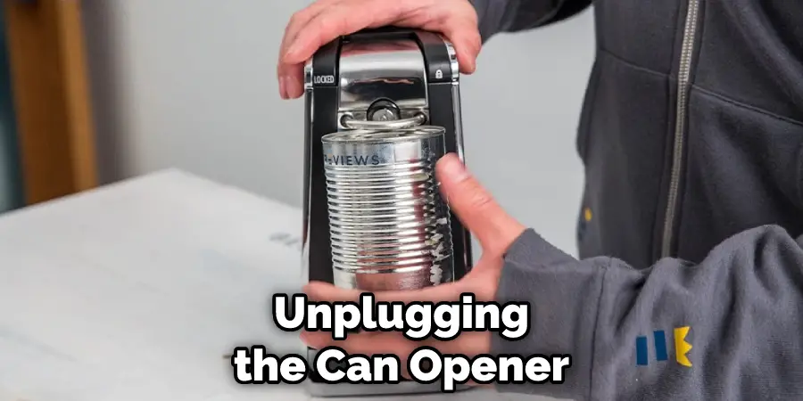 unplugging the can opener