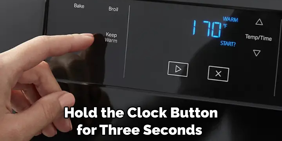 Hold the Clock Button for Three Seconds