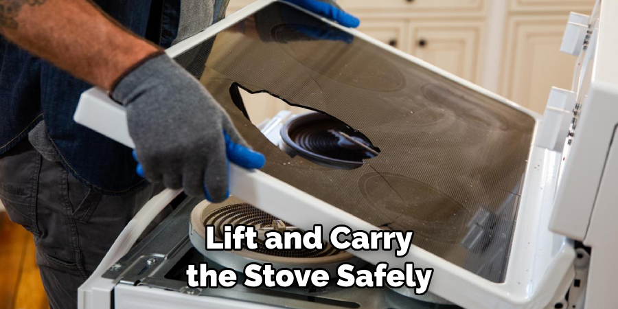 Lift and Carry the Stove Safely