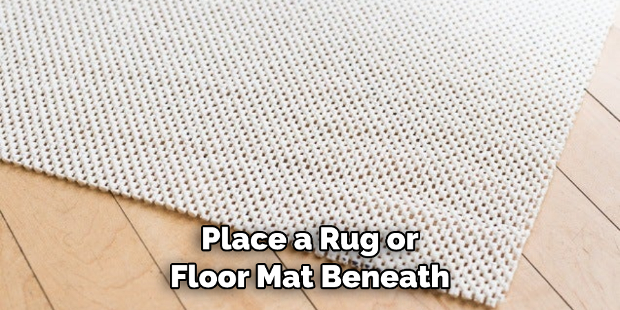 Place a Rug or Floor Mat Beneath