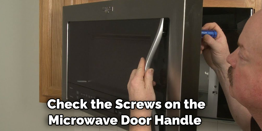  Check the Screws on the Microwave Door Handle