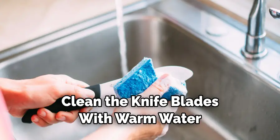 Clean the Knife Blades With Warm Water