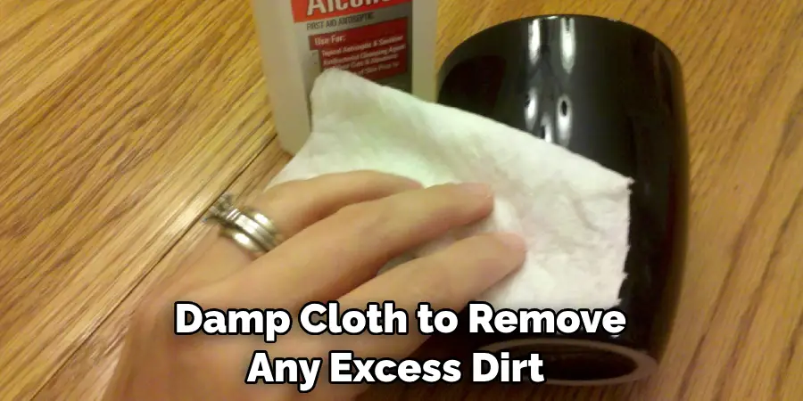 Damp Cloth to Remove Any Excess Dirt 