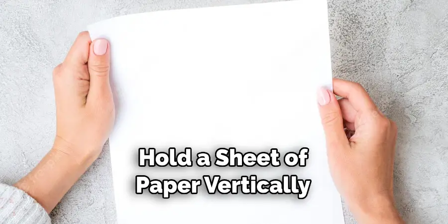 Hold a Sheet of Paper Vertically