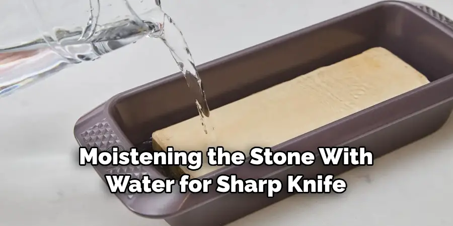 Moistening the Stone With Water for Sharp Knife