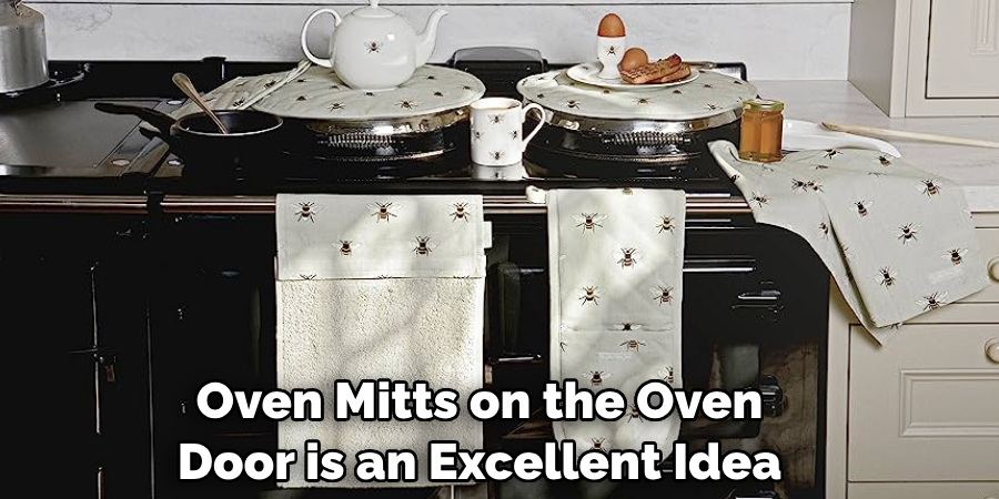 Oven Mitts on the Oven Door is an Excellent Idea