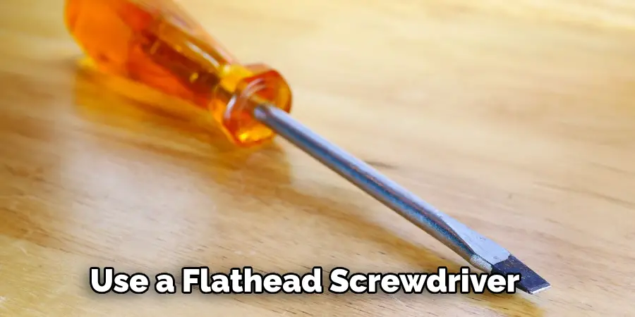 Use a Flathead Screwdriver