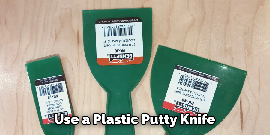 Use a Plastic Putty Knife