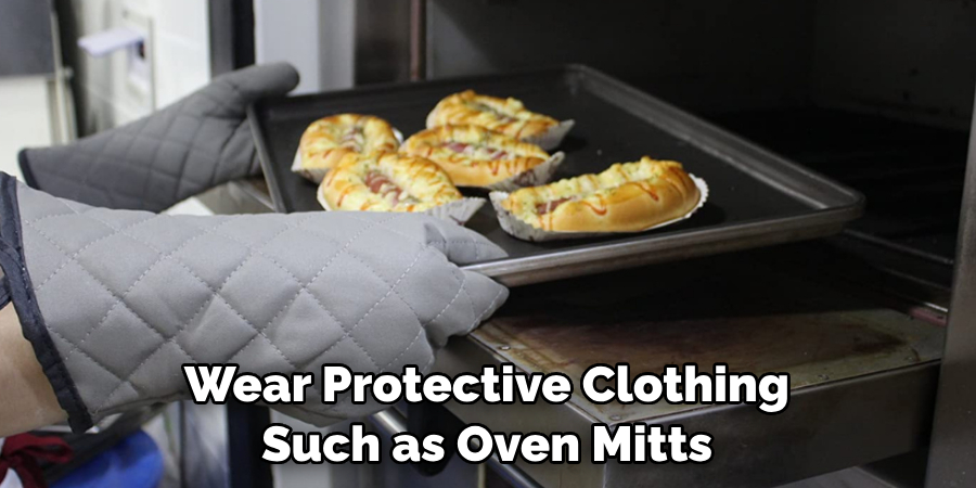 Wear Protective Clothing Such as Oven Mitts