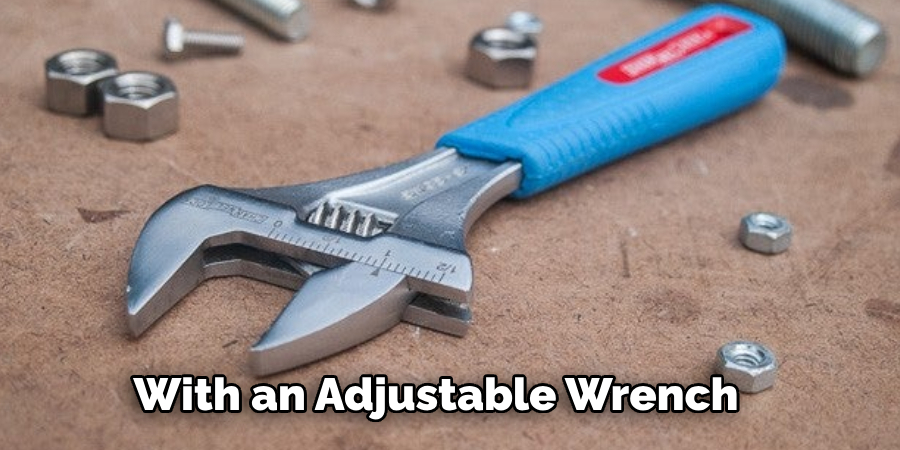 With an Adjustable Wrench