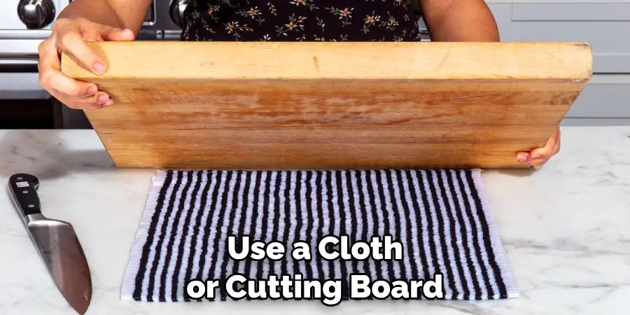 Use a Cloth or Cutting Board