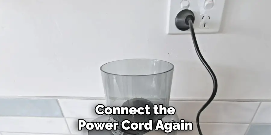 Connect the Power Cord Again