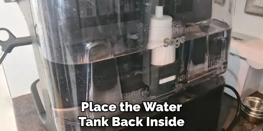 Place the Water Tank Back Inside