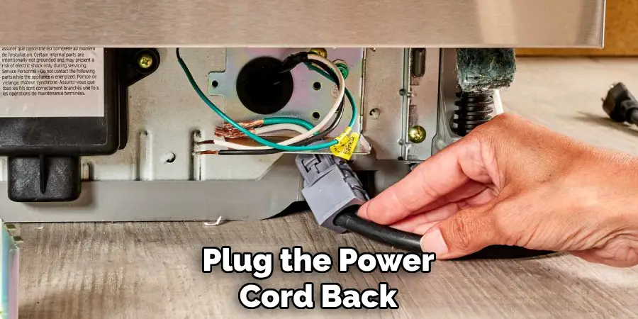 Plug the Power Cord Back