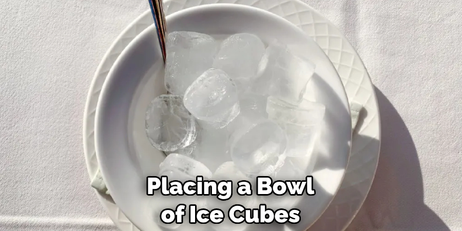 Placing a Bowl of Ice Cubes