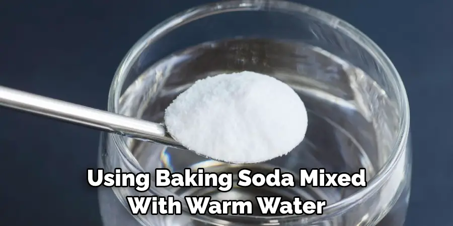 Using Baking Soda Mixed With Warm Water