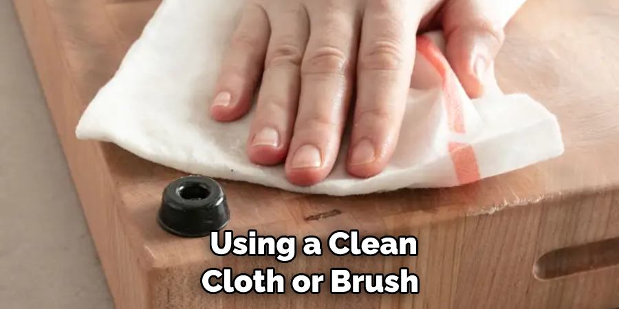 Using a Clean Cloth or Brush