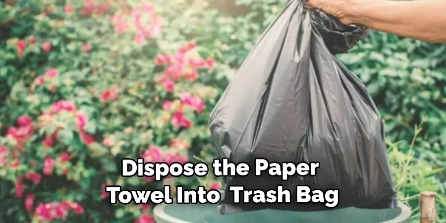 Dispose the Paper Towel Into  Trash Bag