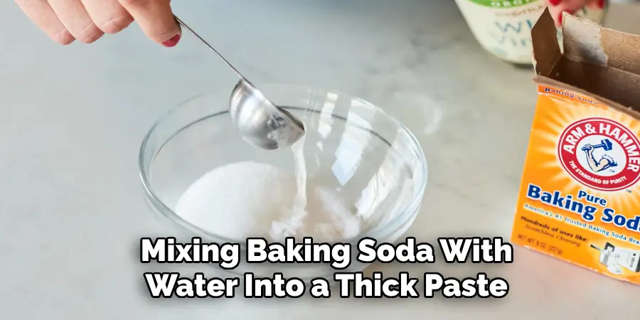 Mixing Baking Soda With Water Into a Thick Paste