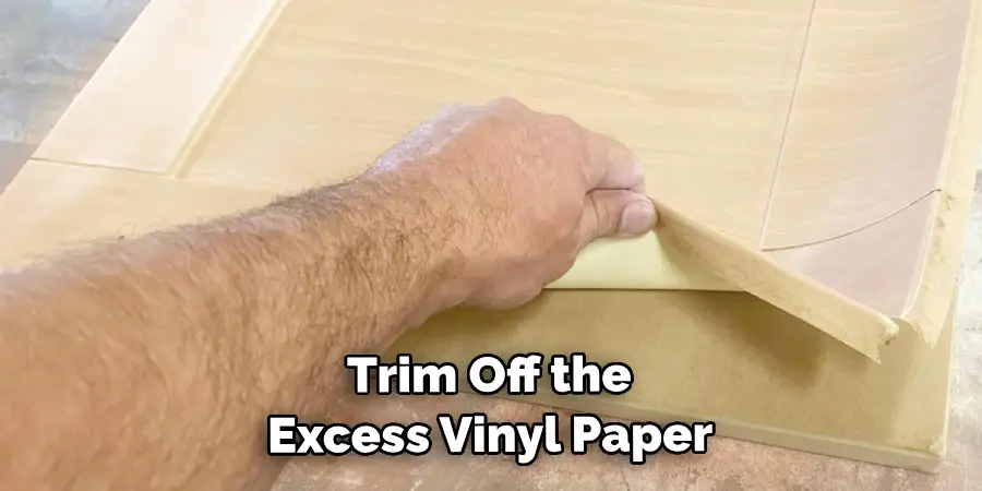  Trim Off the Excess Vinyl Paper