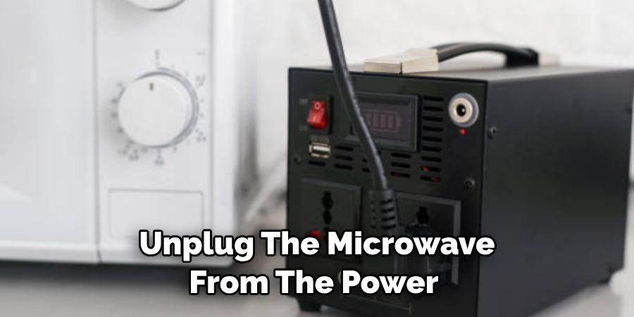 Unplug the Microwave From the Power 