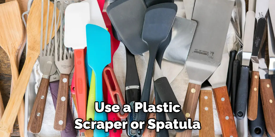 Use a Plastic Scraper or Spatula