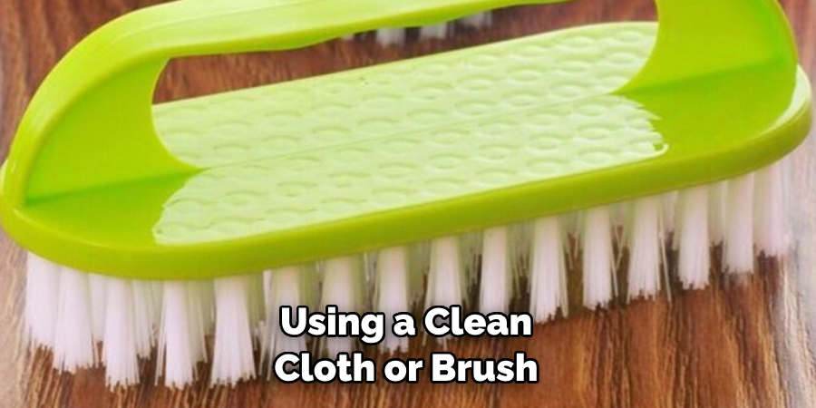 Using a Clean Cloth or Brush