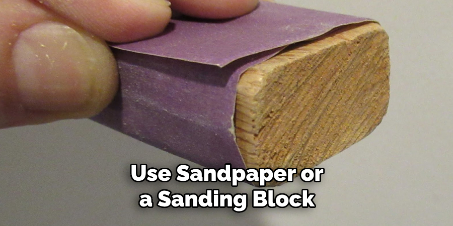 Use Sandpaper or a Sanding Block