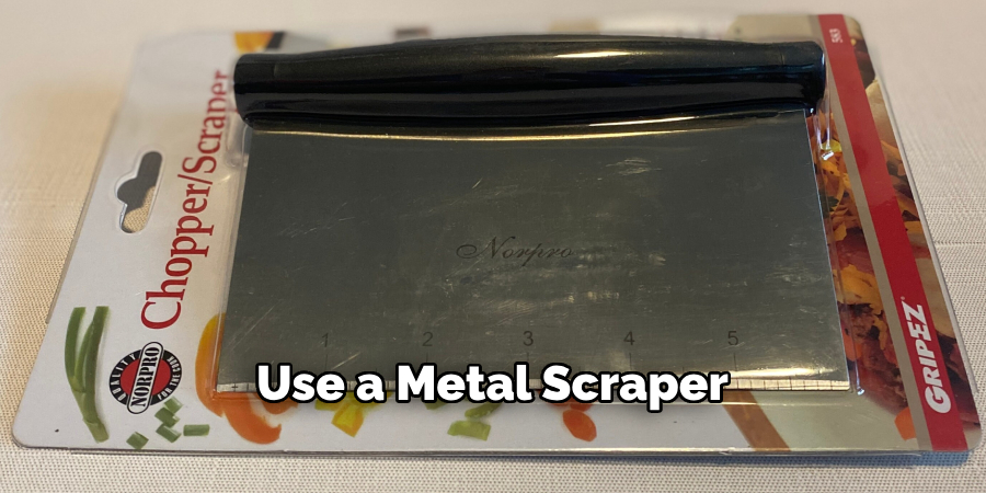 Use a Metal Scraper 