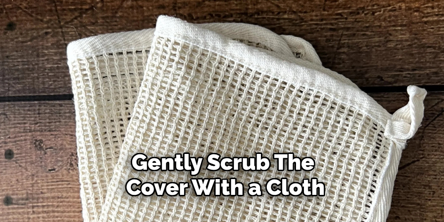 Gently Scrub the Cover With a Cloth