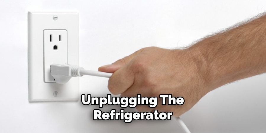 unplugging the refrigerator