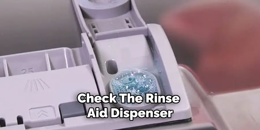 Check the Rinse Aid Dispenser