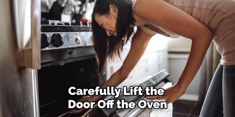 Carefully Lift the Door Off the Oven