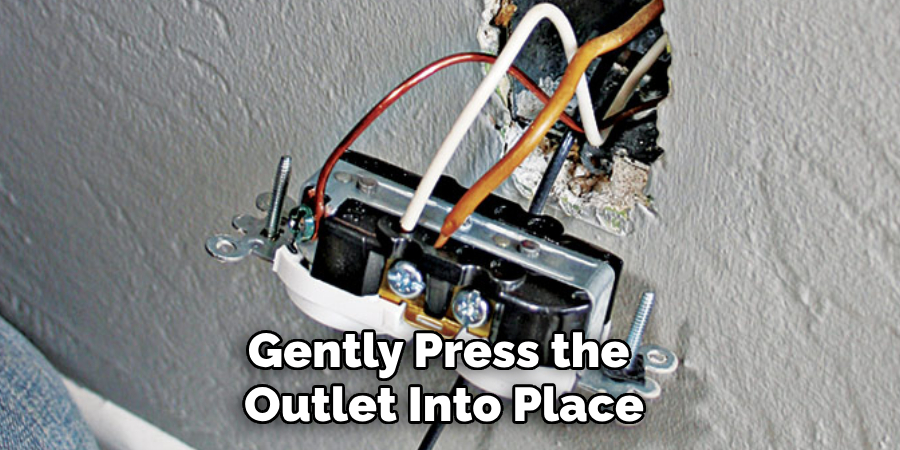 Gently Press the Outlet Into Place