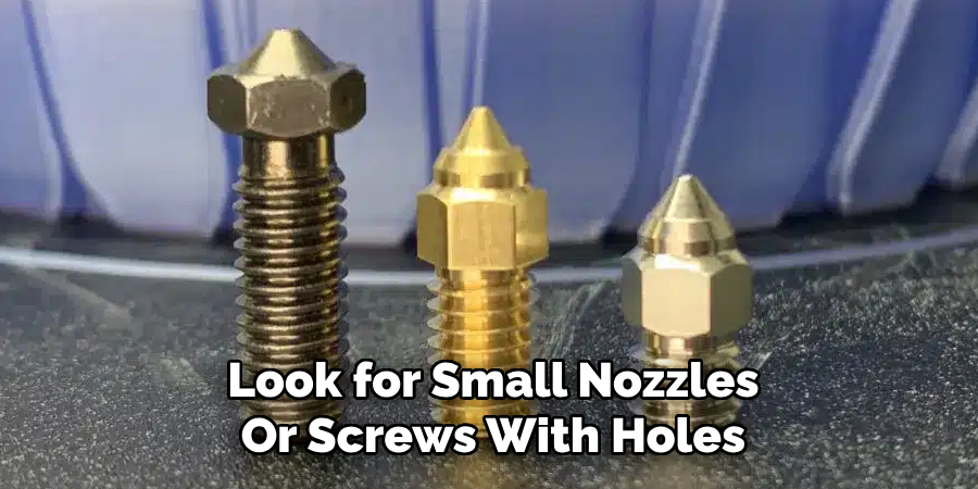 Look for Small Nozzles
Or Screws With Holes