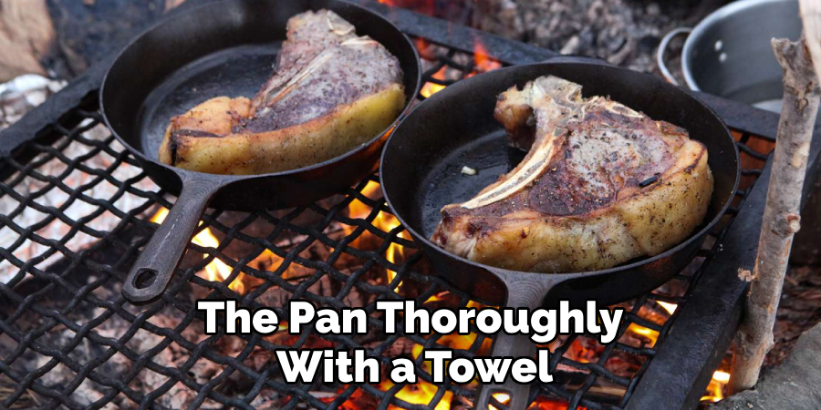 The Pan Thoroughly With a Towel