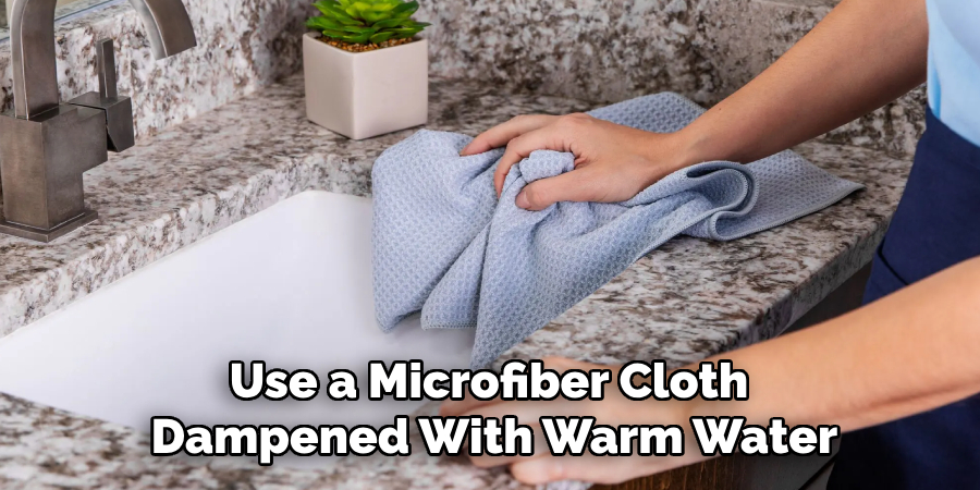 Use a Microfiber Cloth Dampened With Warm Water